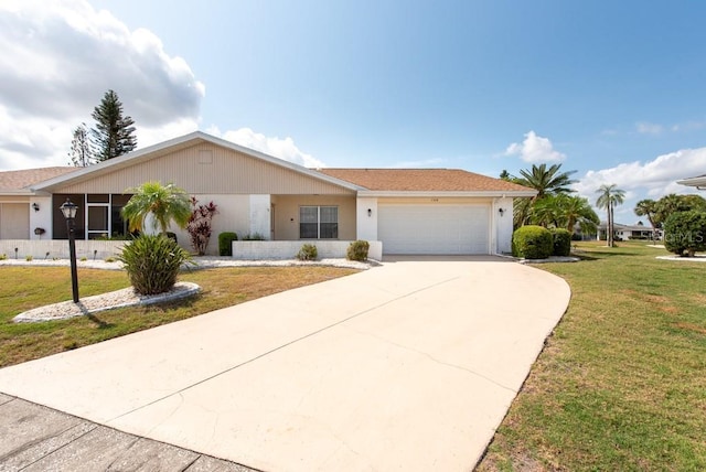 106 Silverbell Ct, Sun City Center, FL 33573 - single story home featuring an attached garage, driveway, and a front lawn