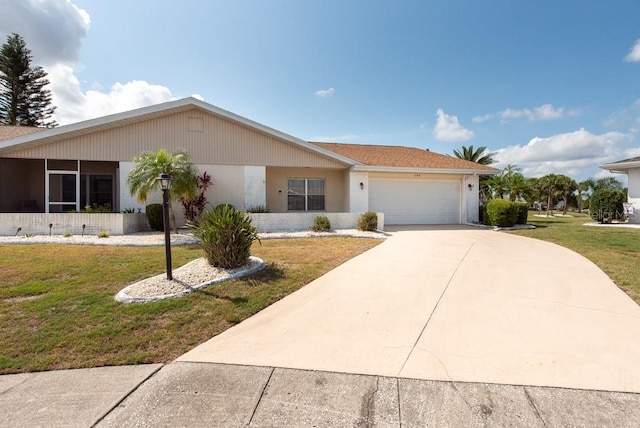 106 Silverbell Ct, Sun City Center, FL 33573 - ranch-style house featuring a garage, concrete driveway, and a front yard