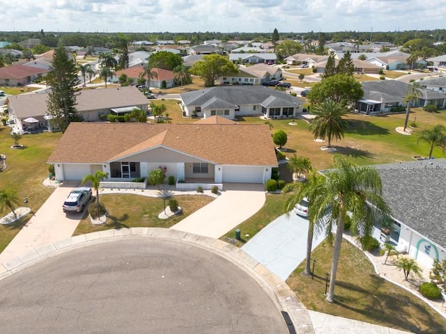 106 Silverbell Ct, Sun City Center, FL 33573 - aerial perspective of suburban area