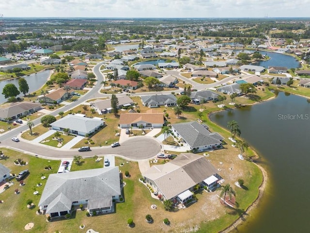 106 Silverbell Ct, Sun City Center, FL 33573 - aerial view of property's location featuring nearby suburban area and a large body of water