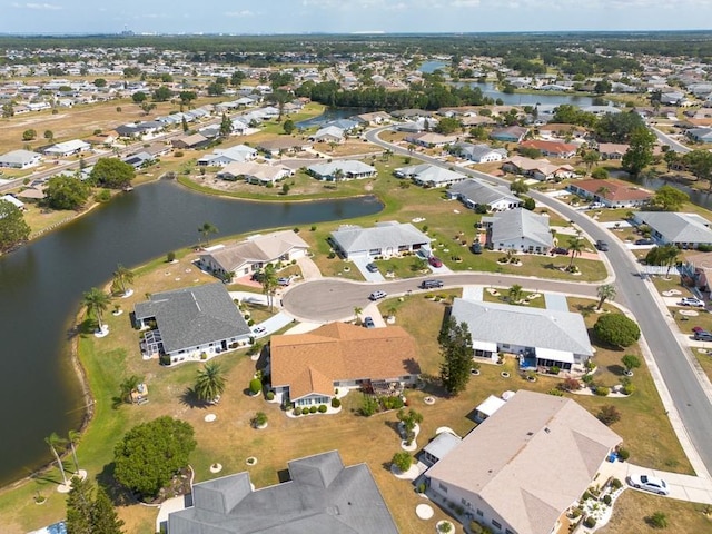 106 Silverbell Ct, Sun City Center, FL 33573 - aerial overview of property's location featuring a nearby body of water and nearby suburban area