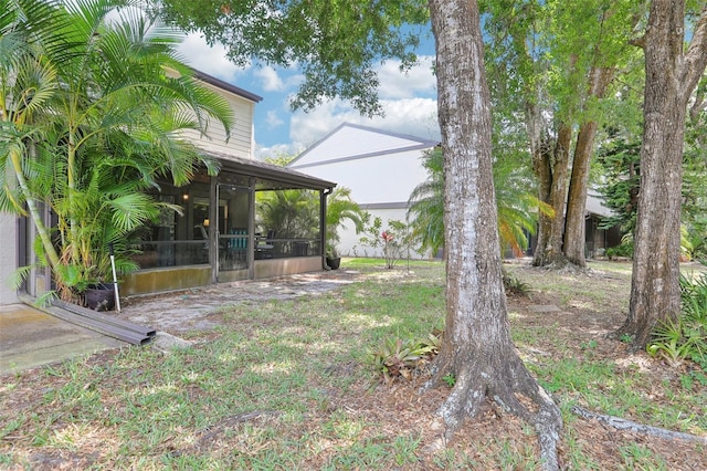 330 Woods Landing Trl, Oldsmar, FL 34677 - view of yard with a sunroom