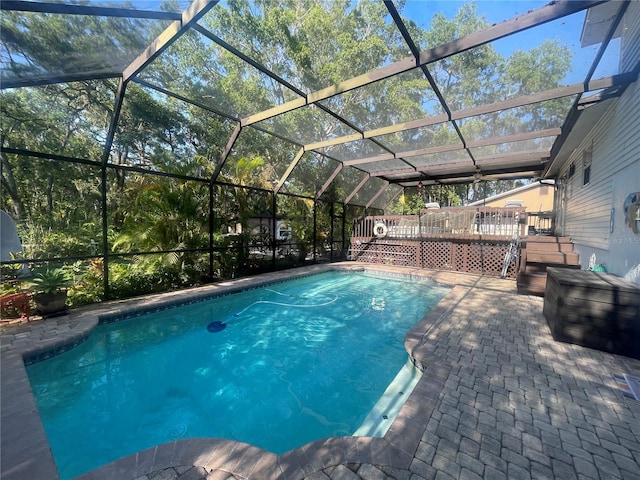 6073 115th Ave N, Pinellas Park, FL 33782 - outdoor pool with a wooden deck and a lanai