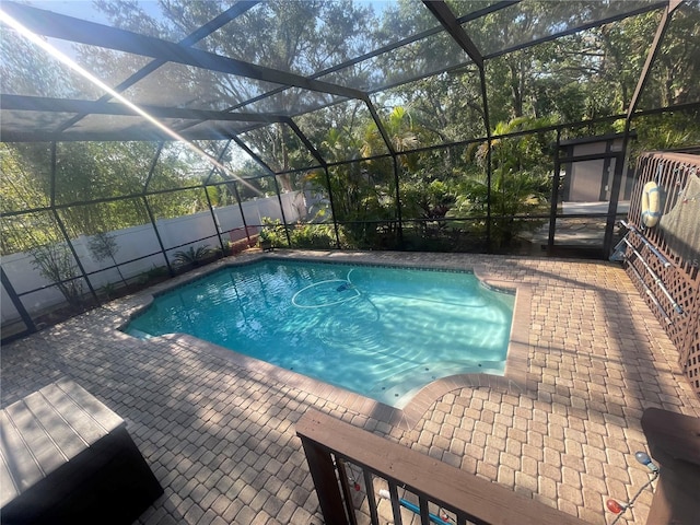6073 115th Ave N, Pinellas Park, FL 33782 - view of swimming pool with a patio and glass enclosure