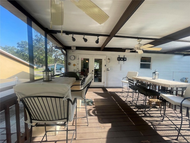 6073 115th Ave N, Pinellas Park, FL 33782 - sunroom with outdoor dining space, a ceiling fan, french doors, and beam ceiling