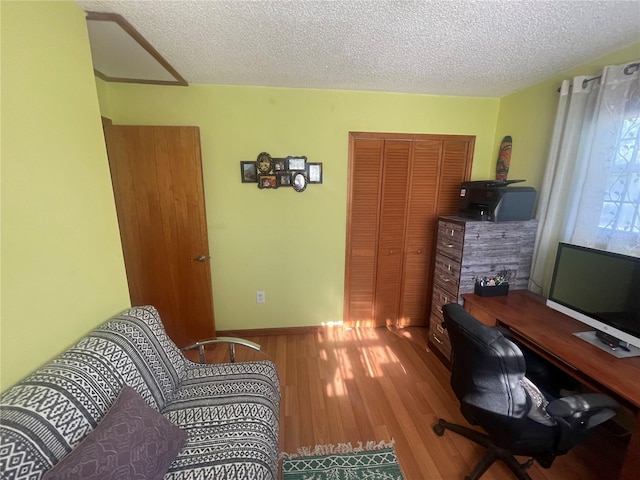 6073 115th Ave N, Pinellas Park, FL 33782 - home office featuring a textured ceiling and wood finished floors