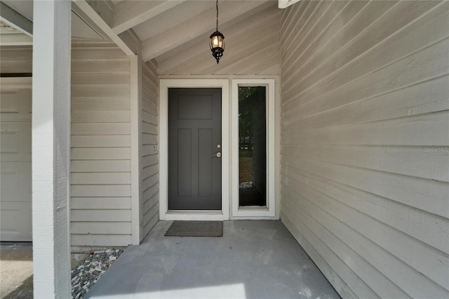 property entrance featuring a garage