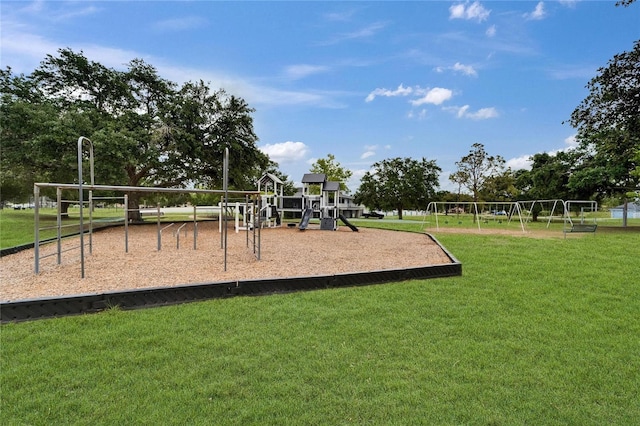 community play area featuring a lawn