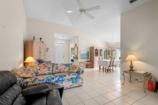 2413 Oxford Down Ct Unit 58, Sun City Center, FL 33573 - living area featuring lofted ceiling, a ceiling fan, plenty of natural light, a chandelier, and light tile patterned floors
