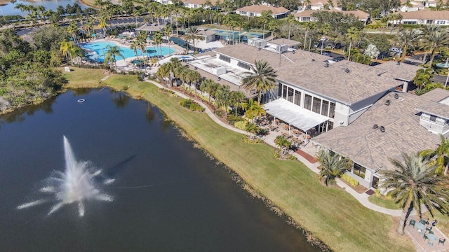 2413 Oxford Down Ct Unit 58, Sun City Center, FL 33573 - aerial view of property's location with a large body of water and a pool area