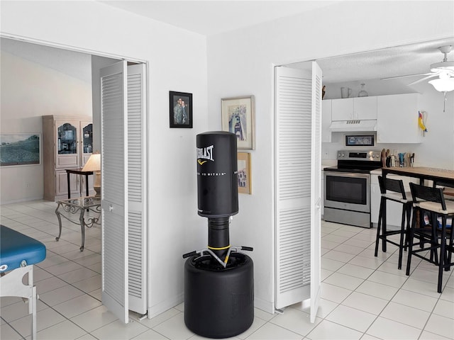 2413 Oxford Down Ct Unit 58, Sun City Center, FL 33573 - hall with light tile patterned floors