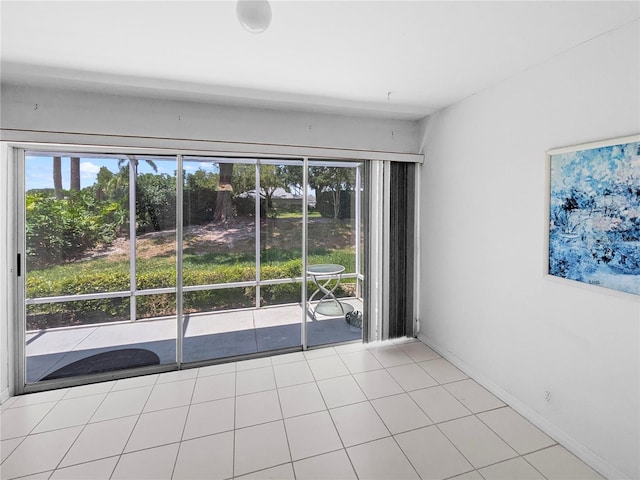 2413 Oxford Down Ct Unit 58, Sun City Center, FL 33573 - unfurnished room with plenty of natural light and baseboards