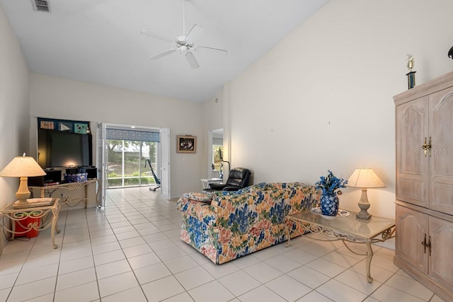 2413 Oxford Down Ct Unit 58, Sun City Center, FL 33573 - living area with ceiling fan, light tile patterned flooring, and high vaulted ceiling
