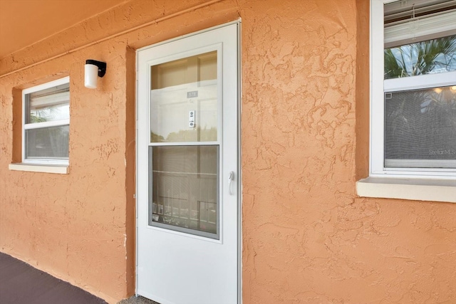 12760 Indian Rocks Rd Unit 578, Largo, FL 33774 - property entrance with stucco siding