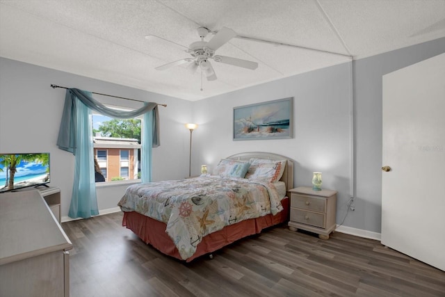 12760 Indian Rocks Rd Unit 578, Largo, FL 33774 - bedroom featuring wood finished floors, a ceiling fan, baseboards, and a textured ceiling