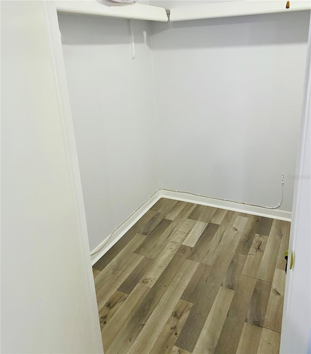 12760 Indian Rocks Rd Unit 578, Largo, FL 33774 - walk in closet with wood finished floors