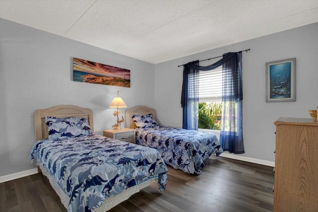 12760 Indian Rocks Rd Unit 578, Largo, FL 33774 - bedroom with baseboards and wood finished floors