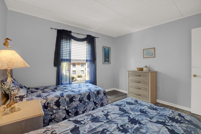 12760 Indian Rocks Rd Unit 578, Largo, FL 33774 - bedroom with wood finished floors and baseboards