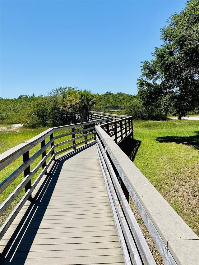 12760 Indian Rocks Rd Unit 578, Largo, FL 33774 - wooden terrace with a yard
