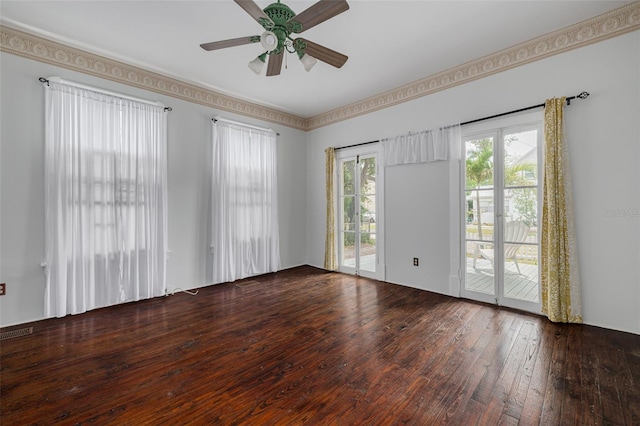 empty room featuring wood-type flooring and a ceiling fan