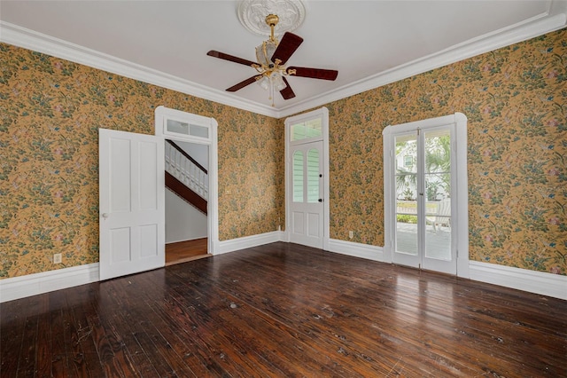 unfurnished room featuring hardwood / wood-style floors, ceiling fan, and crown molding