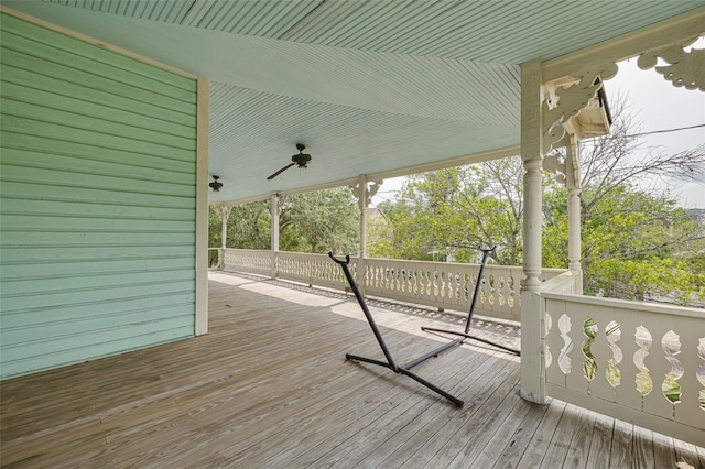 wooden deck with ceiling fan