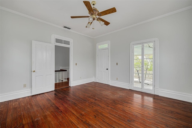 empty room featuring hardwood / wood-style floors, ceiling fan, crown molding, and baseboards