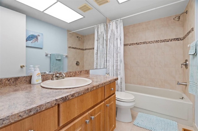 full bath featuring shower / tub combo, tile patterned floors, vanity, and toilet
