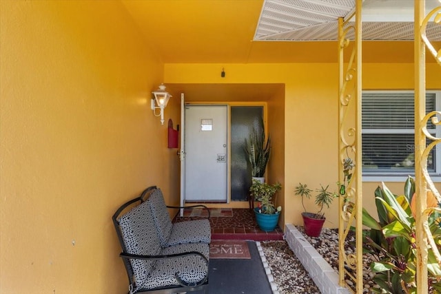 1453 62nd Ter S, Saint Petersburg, FL 33705 - doorway to property with stucco siding