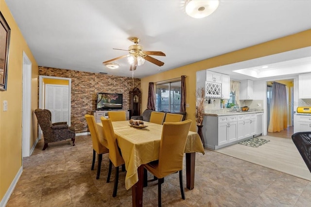 1453 62nd Ter S, Saint Petersburg, FL 33705 - dining space with a ceiling fan and baseboards
