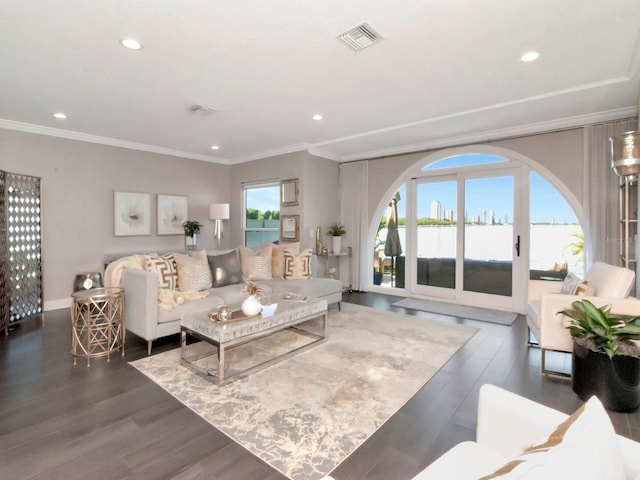 2807 W Hawthorne Rd Unit 11, Tampa, FL 33611 - living area with recessed lighting, wood finished floors, ornamental molding, and a water view