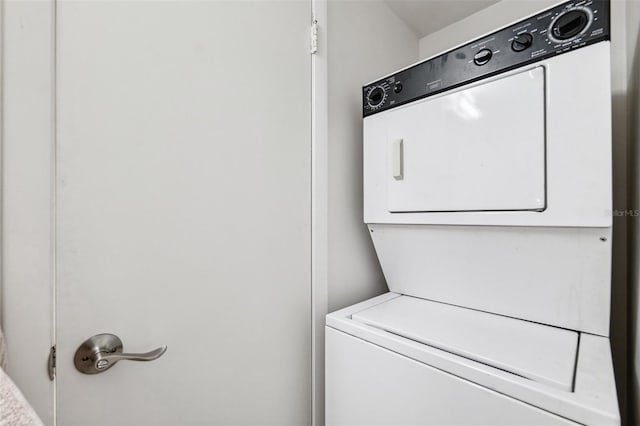 5712 Biscayne Ct Unit 103, New Port Richey, FL 34652 - washroom with stacked washer / drying machine