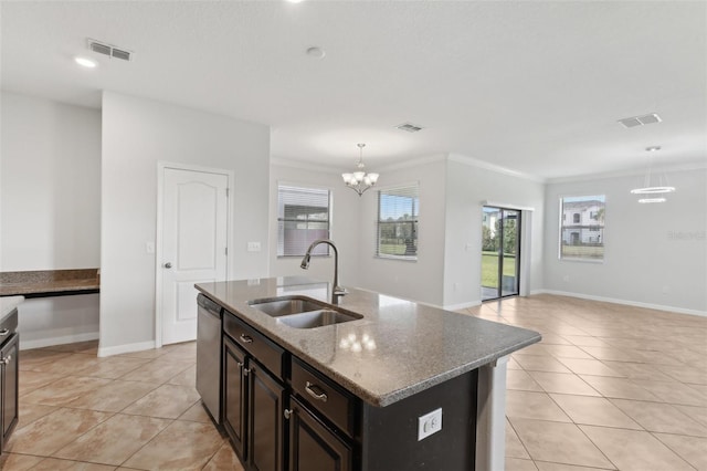 1119 Ballard Green Pl, Brandon, FL 33511 - kitchen featuring a sink, a chandelier, light tile patterned floors, stainless steel dishwasher, and crown molding