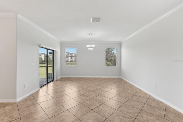 1119 Ballard Green Pl, Brandon, FL 33511 - unfurnished room featuring crown molding, light tile patterned floors, and baseboards
