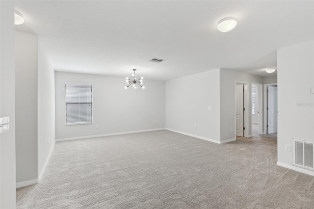 1119 Ballard Green Pl, Brandon, FL 33511 - carpeted spare room with a chandelier and baseboards