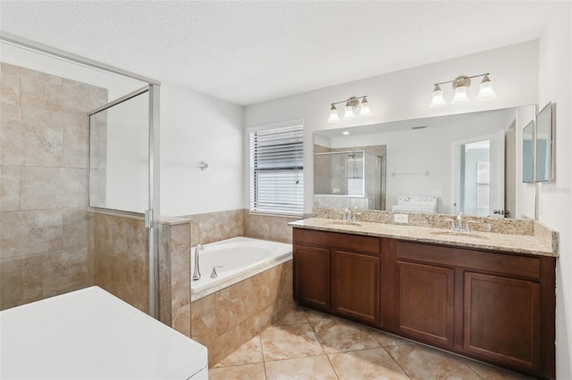 1119 Ballard Green Pl, Brandon, FL 33511 - full bathroom featuring a shower stall, a garden tub, tile patterned floors, and double vanity