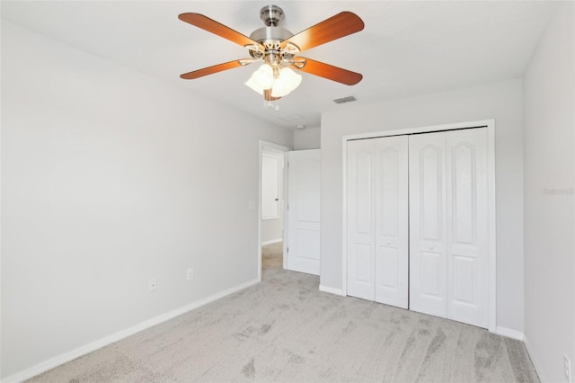 1119 Ballard Green Pl, Brandon, FL 33511 - unfurnished bedroom featuring carpet flooring, baseboards, a closet, and ceiling fan