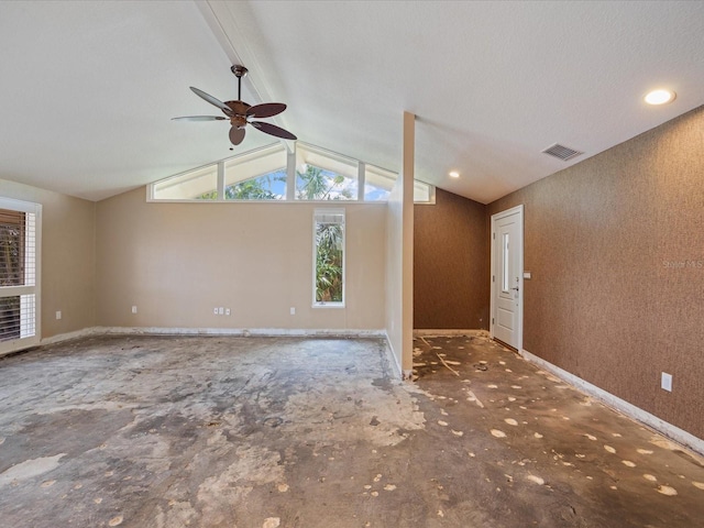 unfurnished living room featuring a ceiling fan, lofted ceiling, and baseboards