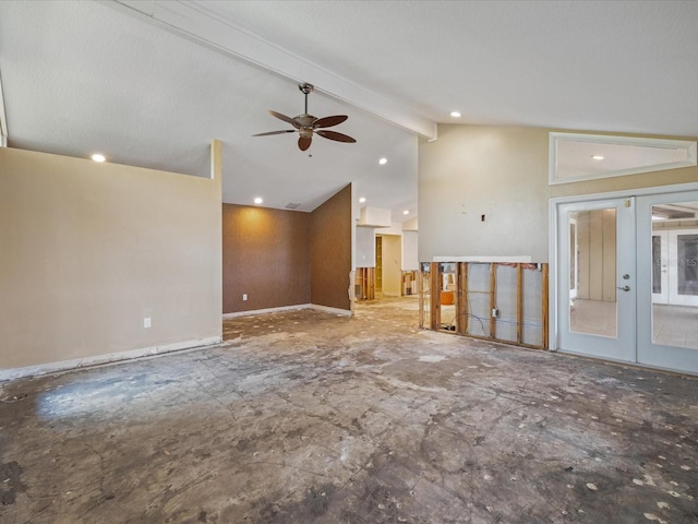 unfurnished living room featuring french doors and ceiling fan