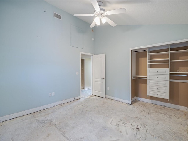 unfurnished bedroom with a closet, baseboards, high vaulted ceiling, and ceiling fan
