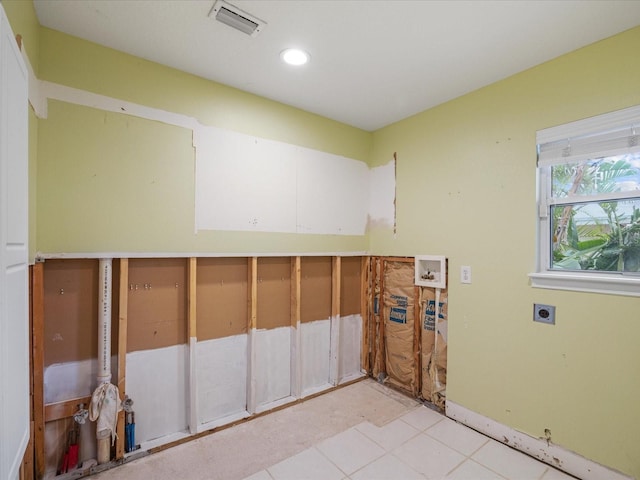 washroom featuring hookup for an electric dryer, washer hookup, recessed lighting, and light tile patterned floors