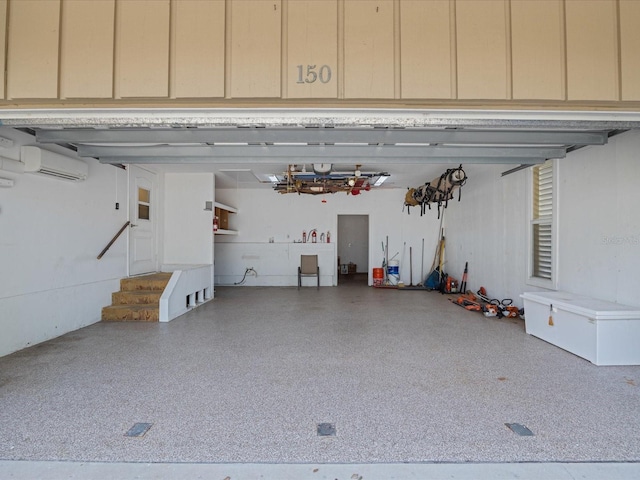 garage with a wall mounted AC