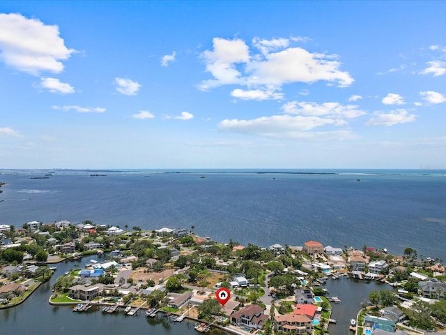 aerial perspective of suburban area featuring a large body of water