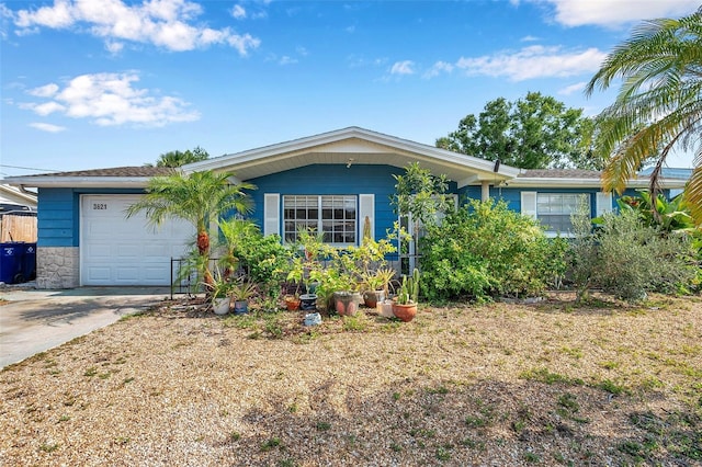 3621 Beacon Square Dr, Holiday, FL 34691 - ranch-style house featuring an attached garage and driveway