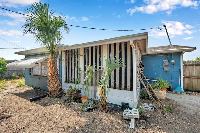 3621 Beacon Square Dr, Holiday, FL 34691 - view of front facade featuring fence
