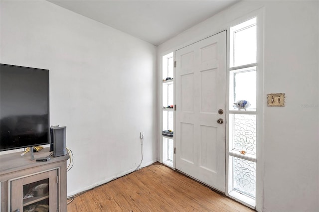 3621 Beacon Square Dr, Holiday, FL 34691 - entrance foyer with light wood-type flooring