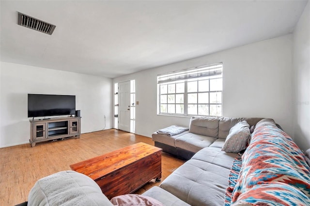 3621 Beacon Square Dr, Holiday, FL 34691 - living area featuring wood finished floors