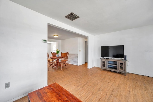 3621 Beacon Square Dr, Holiday, FL 34691 - living room with wood finished floors