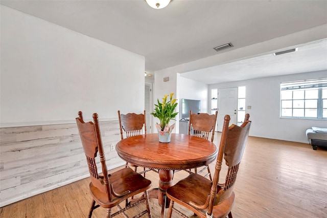 3621 Beacon Square Dr, Holiday, FL 34691 - dining room with light wood-style flooring