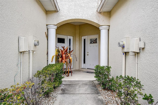 14985 Alan Ct, Largo, FL 33771 - view of exterior entry featuring stucco siding
